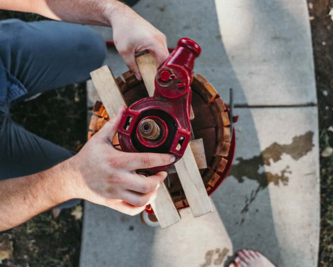 pieces of an apple cider press