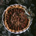 flatlay of pecan pie with florals